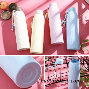 Chai thủy tinh ốp nhựa nắp dây xách